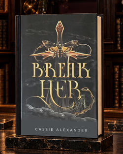 Break Her dust-jacket hardcover in a warm gilded library