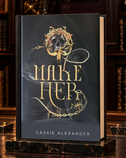 Make Her dust-jacket hardcover in a warm gilded library
