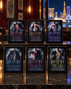All six Dark Ink Tattoo ebooks on tablets in a Las Vegas tattoo studio